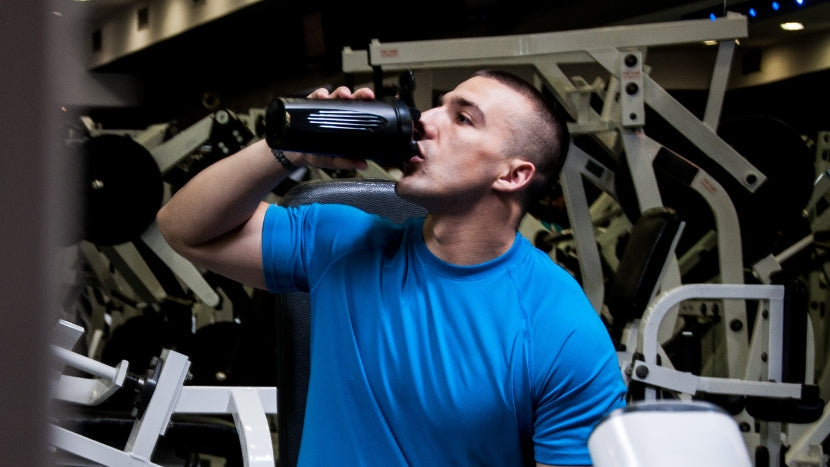 Man Drinking Pre Workout Supplement
