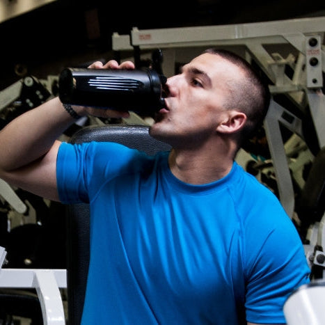 Man Drinking Pre Workout Supplement